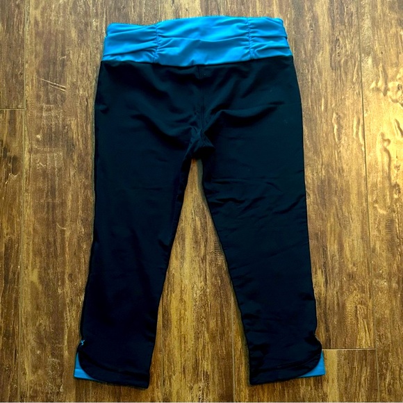 EUC Under Armour black capri yoga pants turquoise blue waistband leggings - Picture 2 of 5